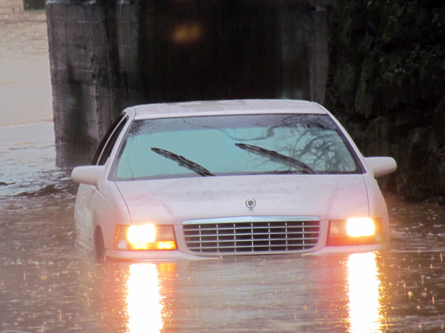 flooded street at south knoxville bridge