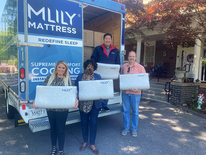 mlily pillow donation to karm