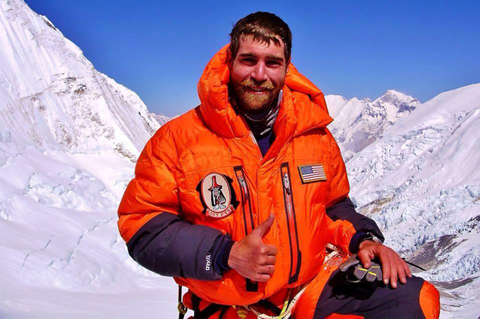 Air Force Maj. Marshall Klitzke gives the thumbs-up while climbing Mount Everest