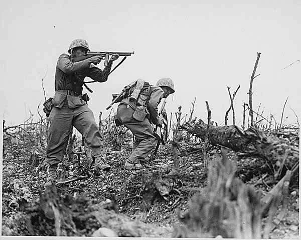 marine aims at japanese sniper WWII