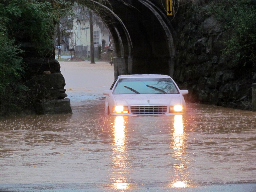 flooded street at south knoxville bridge