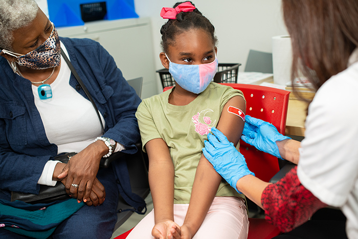 child receives pfizer vaccine